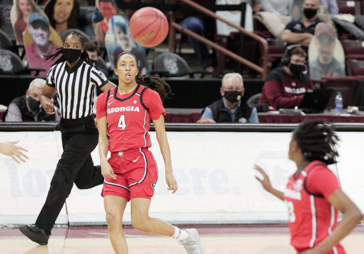 Georgia Lady Bulldogs guard Mikayla Coombs (4) passes the ball at Colonial Life Arena on Thursday, January 21, 2021.