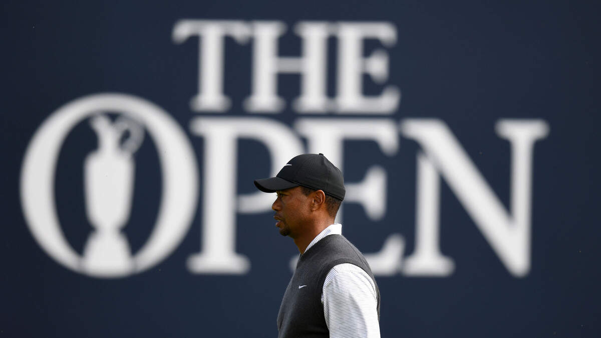 Tiger Woods on the 18th green during the third round of The Open Championship golf tournament at Carnoustie Golf Links.
