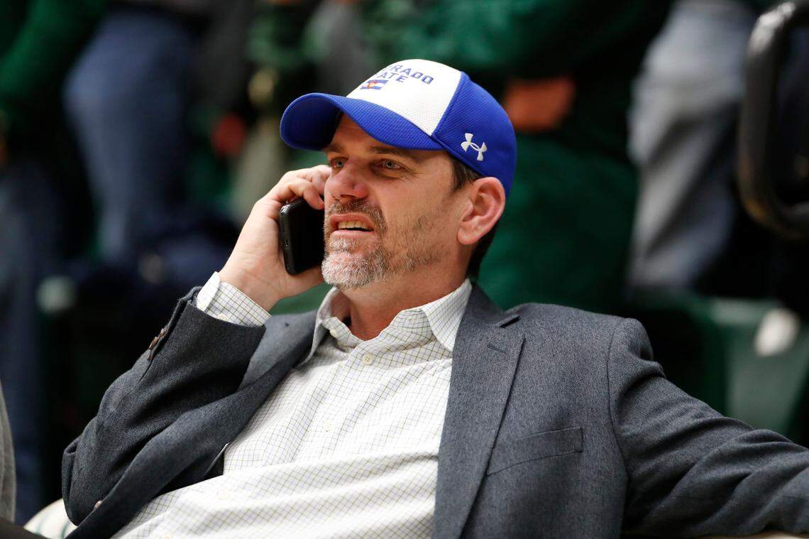 From February 2019: Mike Bobo chats on his mobile phone while seated at an NCAA college basketball game between Nevada and Colorado State in Fort Collins, Colorado.