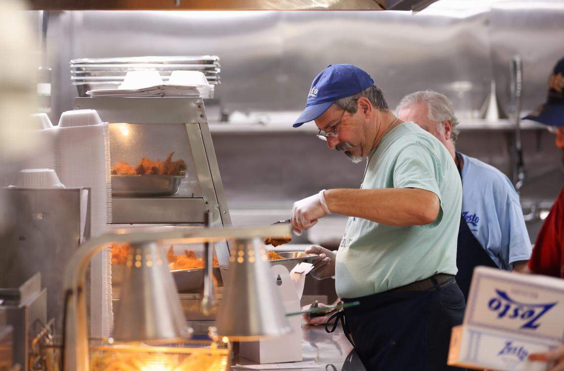 Allen Amick prepares fried chicken at Zesto of West Columbia in on Monday, May 20, 2024. The restaurant, which opened in 1949, is marking its 75th anniversary.