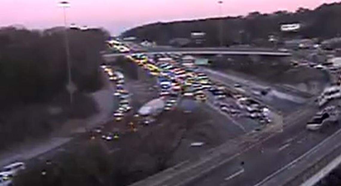 Vehicles are backed up following a collision.