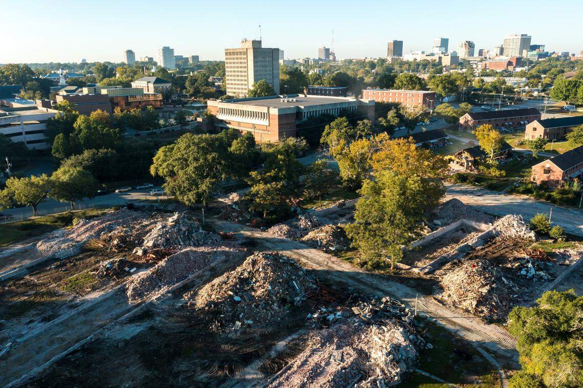 Crews demolish Allen Benedict Court Tuesday morning. The housing complex was built in 1940.