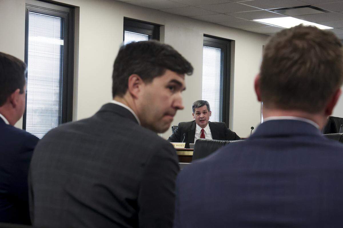 Senate Majority Leader Shane Massey, R-Edgefield, questions, from left, Coastal Carolina Athletic Director Chance Miller, Clemson Athletic Director Graham Neff, and South Carolina Athletic Director Jeremiah Donati, during a meeting of the Senate Education Committee on Wednesday, Feb. 25, 2026.