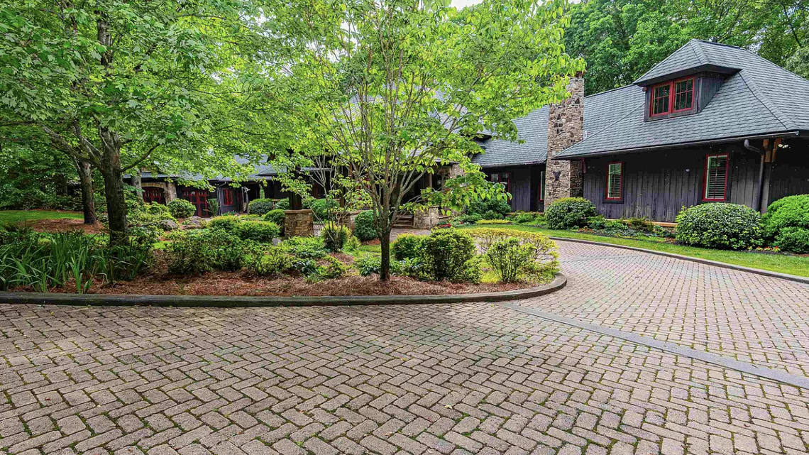 The Cross Hill estate includes almost 100 acres and two houses.