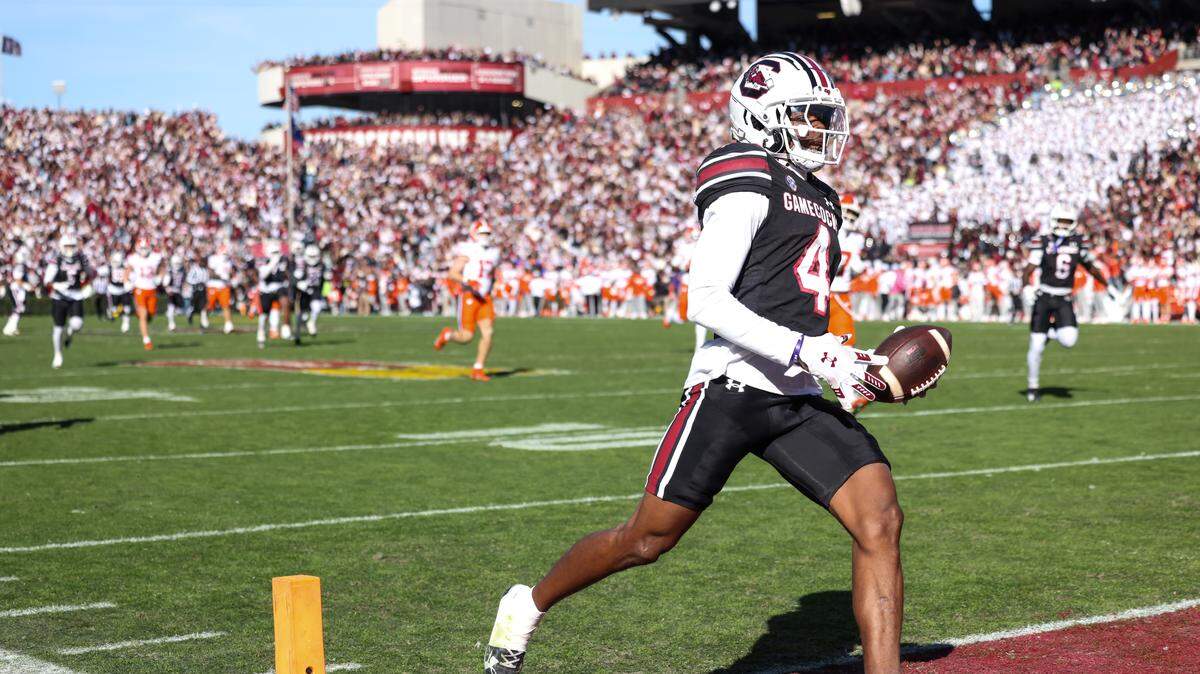 South Carolina wide receiver Vandrevius Jacobs (4) scores a touchdown during first half of South Carolina’s game against Clemson at Williams-Brice Stadium in Columbia on Saturday, November 29, 2025.