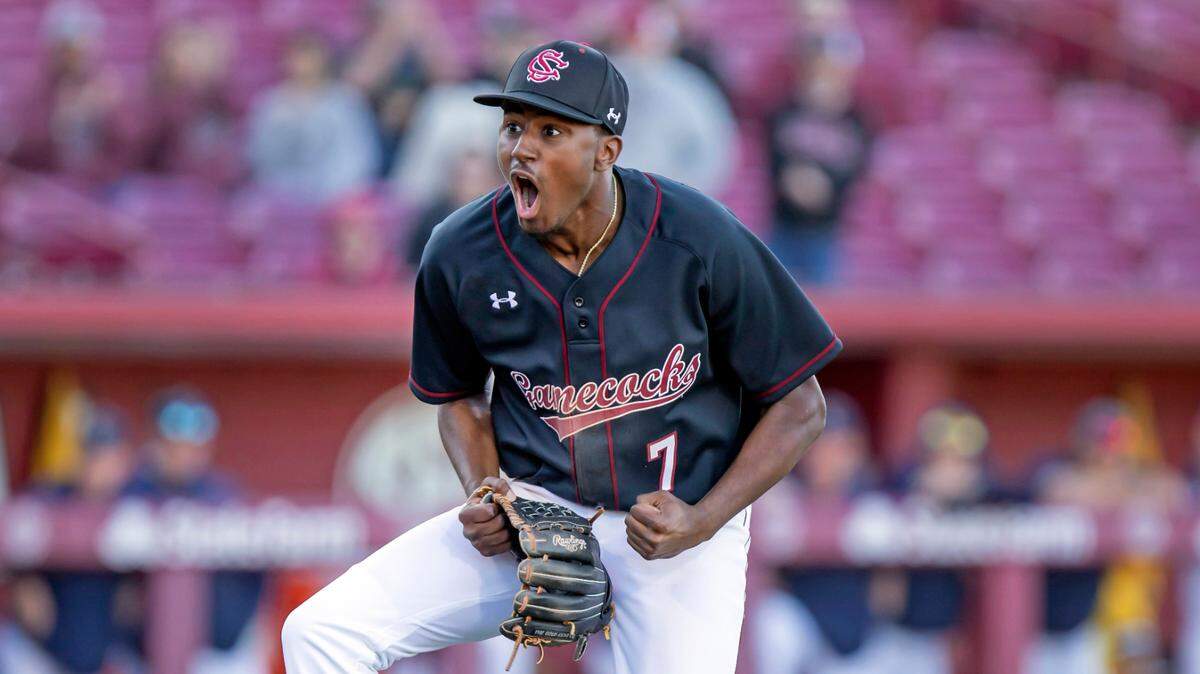 Michael Braswell celebrates after striking out a batter in the top of the 10th inning during the Gamecocks’ game against UNC Greensboro at Founders Park on Sunday, February 20, 2022.
