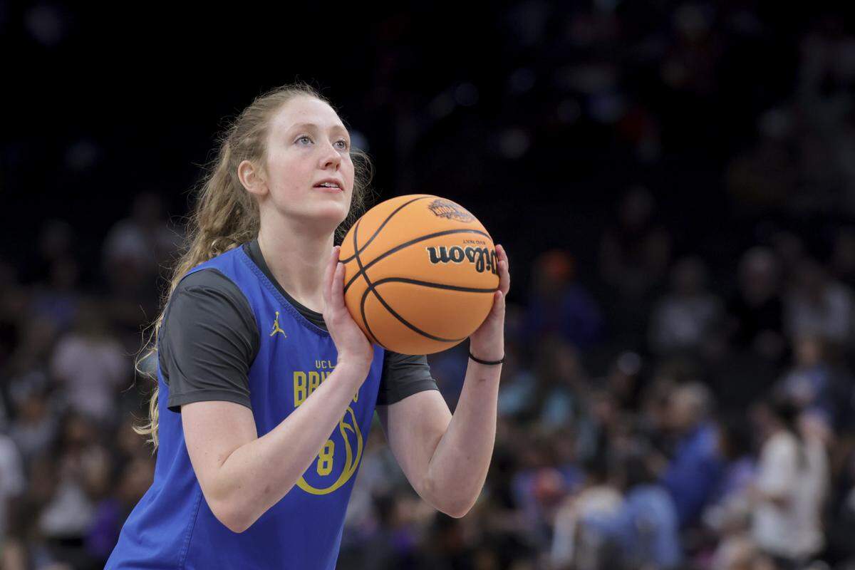 UCLA’s Gianna Kneepken takes a shot during practice at Mortgage Matchup Center in Phoenix on Saturday.
