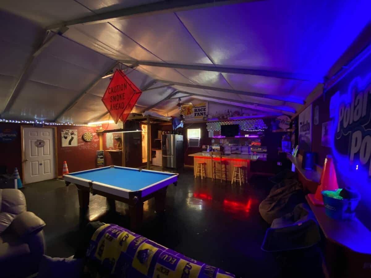 The blow up cave on the property appears well stocked for a group of football fans.