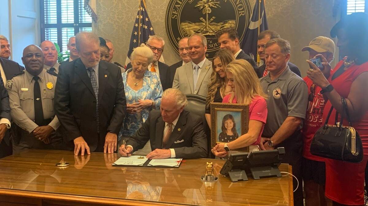 South Carolina Gov. Henry McMaster holds a ceremonial bill signing on Wednesday, July 12, 2023 on a law that expands the ignition interlock program for DUI offenders under Emma’s Law.