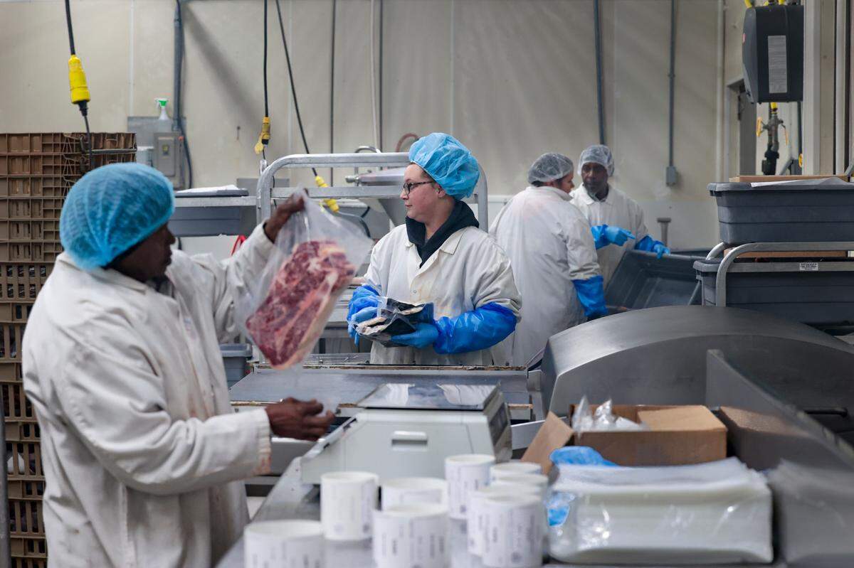 Workers at Williamsburg Packing Co. in Kingstree, S.C. package beef on Wednesday, Feb. 19, 2025.