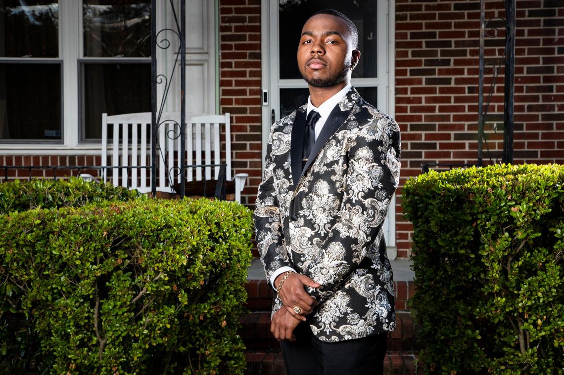 Khalil Catlin, a senior at Dreher High School, poses for a portrait outside his home on Friday, May 15, 2020. He planned an elaborate prom-posal and was disappointed to not be able to go to prom with his date.