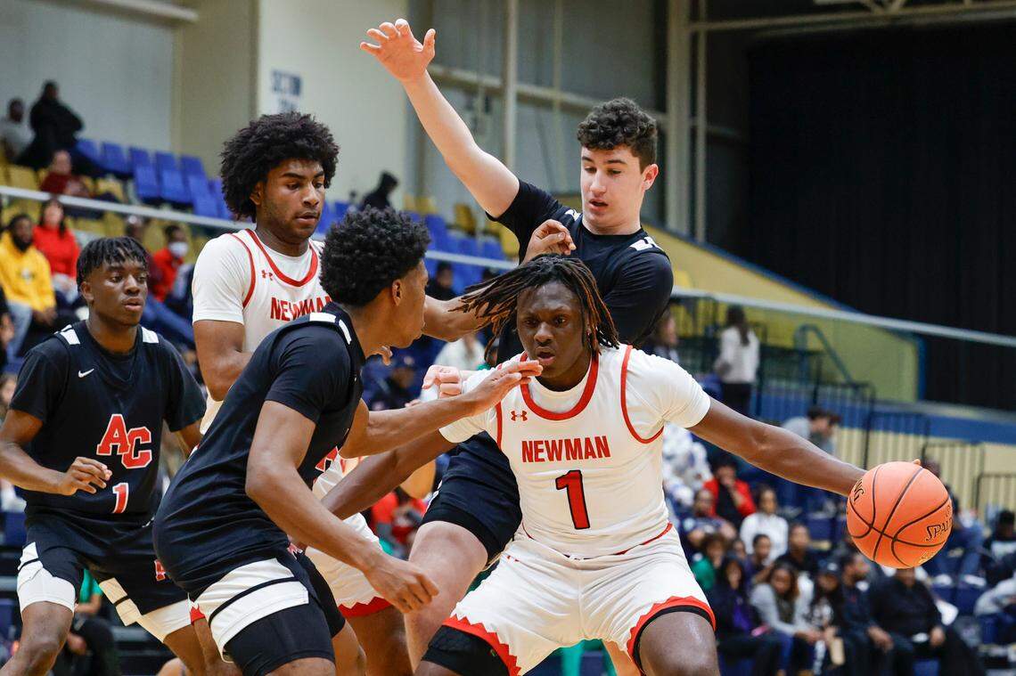 Cardinal Newman’s Amarii King (1)defends during the first half of action in the Class 4A SC Independent Schools Association championship at the Sumter Civic Center on Friday, Feb. 23, 2024