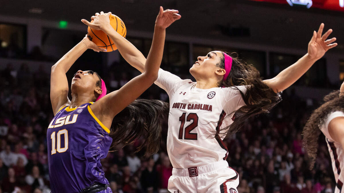South Carolina Gamecocks guard Brea Beal (12) blocks the shot of LSU Lady Tigers forward Angel Reese (10) during South Carolina’s game against the visiting Tigers at Colonial Life Arena in Columbia on Sunday, February 12, 2023.