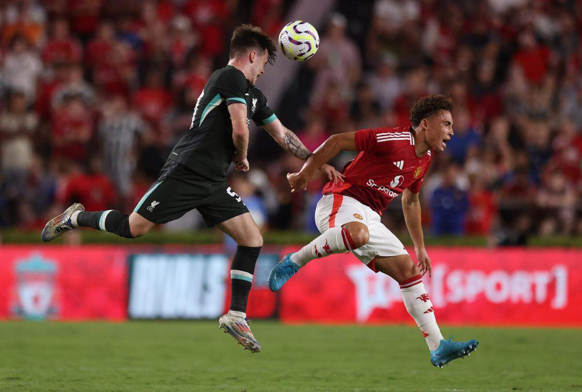 Liverpool midfielder Ben Doak (50) goes up for a header as Manchester’s Sam Murray defends during the Rivals in Red International Friendly soccer match between Manchester United and Liverpool in Columbia on Saturday, August 3, 2024.