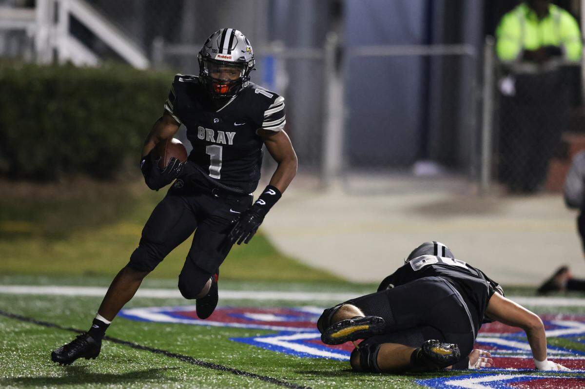 BJ Montgomery (1) of Gray Collegiate carries the ball in for a touchdown during the SCHSL Class 2A state championship between Gray Collegiate and Oceanside Collegiate at Oliver C. Dawson Stadium in Orangeburg on Thursday, November 30, 2023.