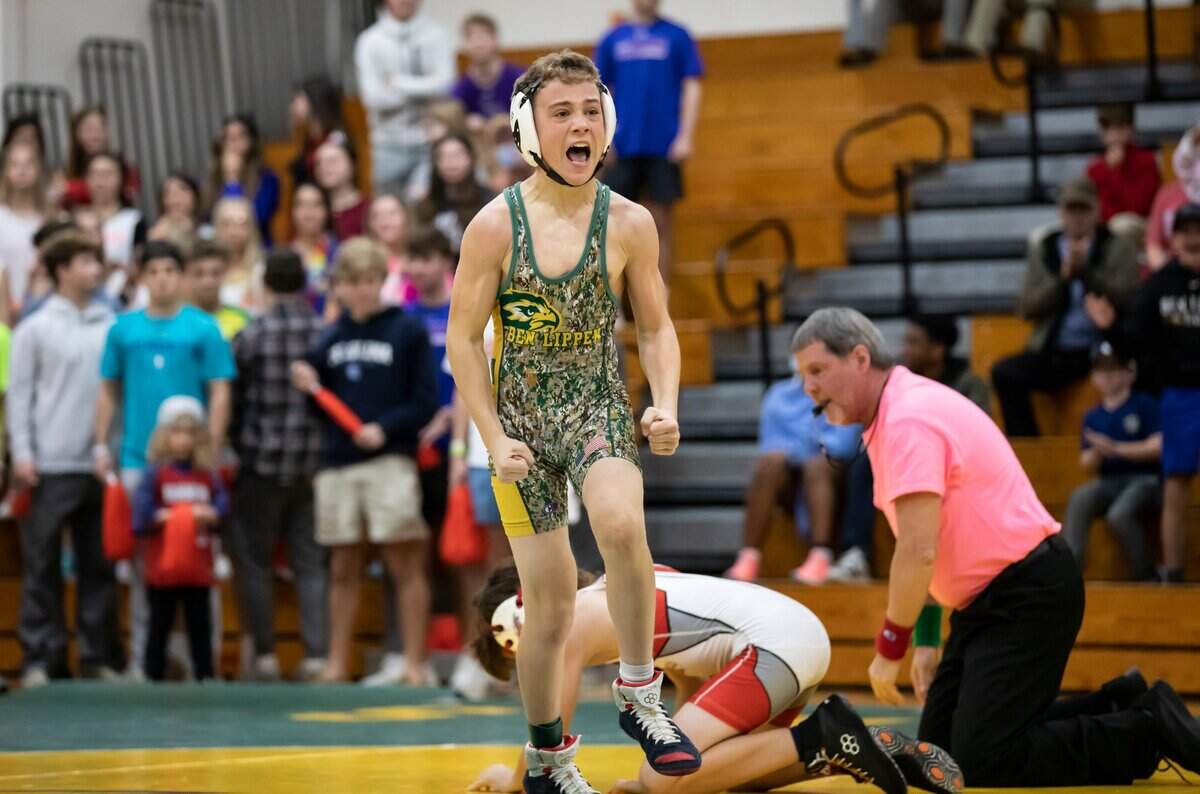 Stone Porter of Ben Lippen celebrates his win over Corbin Rabon of the Hammond School in the SCISA 2022 Duals State Wrestling Tournament at Ben Lippen on Saturday, February 5, 2022.