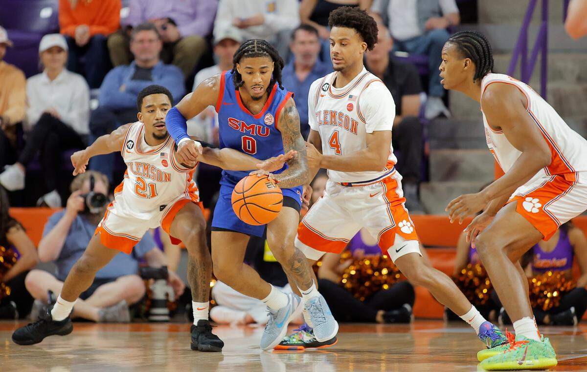 Clemson guard Ace Buckner (21) knocks the ball away from SMU guard B.J. Edwards (0) in Clemson, S.C. on Wednesday, Jan. 7, 2026.