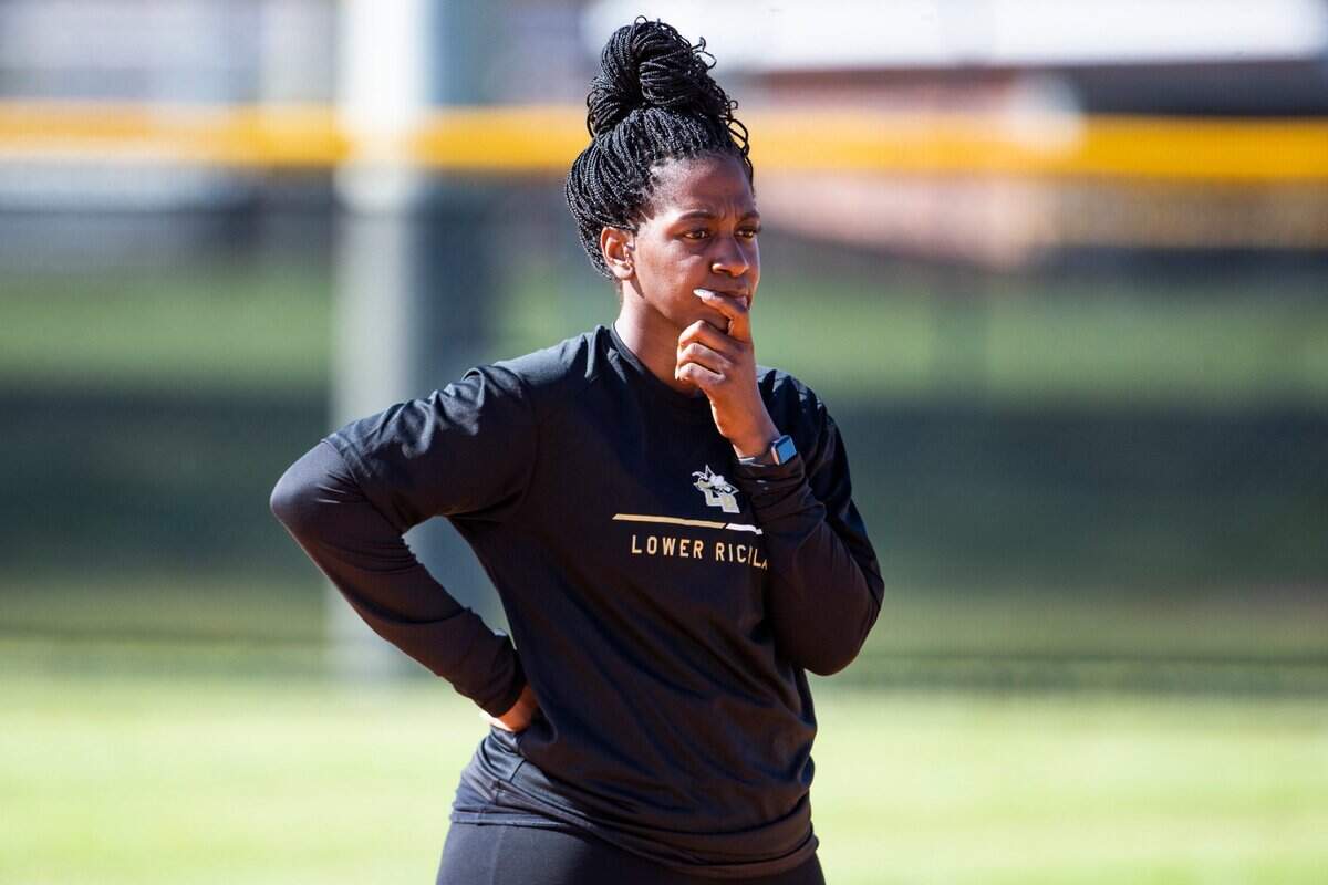 Lower Richland High School softball coach Sheree Jackson leads practice on Thursday, April 7, 2022.