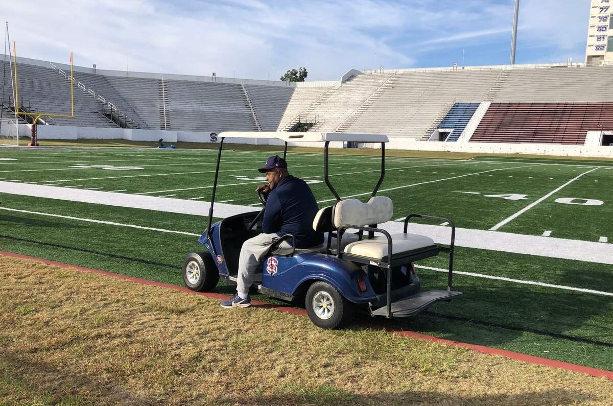 S.C. State head coach Buddy Pough peruses the sidelines at Oliver C. Dawson Stadium in Orangeburg on his personal golf cart after practice on Wednesday ahead of a Thursday game against the South Carolina Gamecocks.