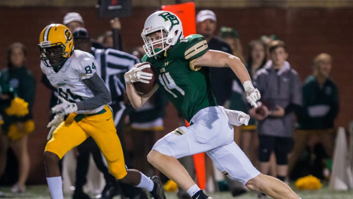 River Bluff Gators receiver Tyson Trottier makes a 75-yard touchdown reception against the Conway Tigers during their playoff game at River Bluff High School.