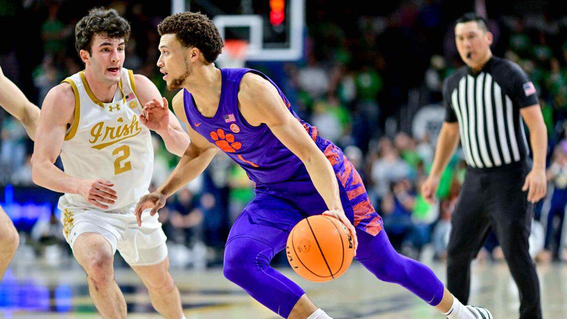 Mar 2, 2024; South Bend, Indiana, USA; Clemson Tigers guard Chase Hunter (1) dribbles as Notre Dame Fighting Irish guard Logan Imes (2) defends in the first half at the Purcell Pavilion.