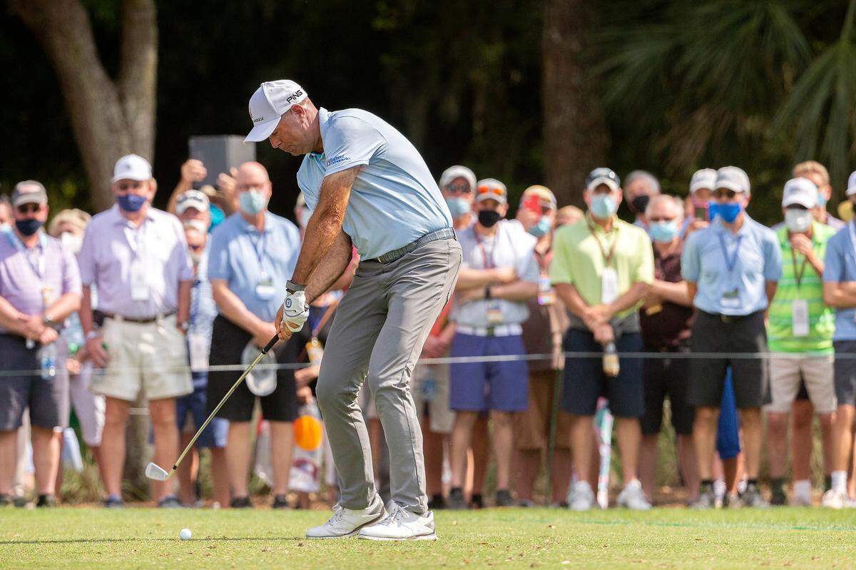 Stewart Cink hits onto the green from the 16th fairway during the final round of the RBC Heritage golf tournament in Hilton Head Island, S.C., Sunday, April 18, 2021. (AP Photo/Stephen B. Morton)