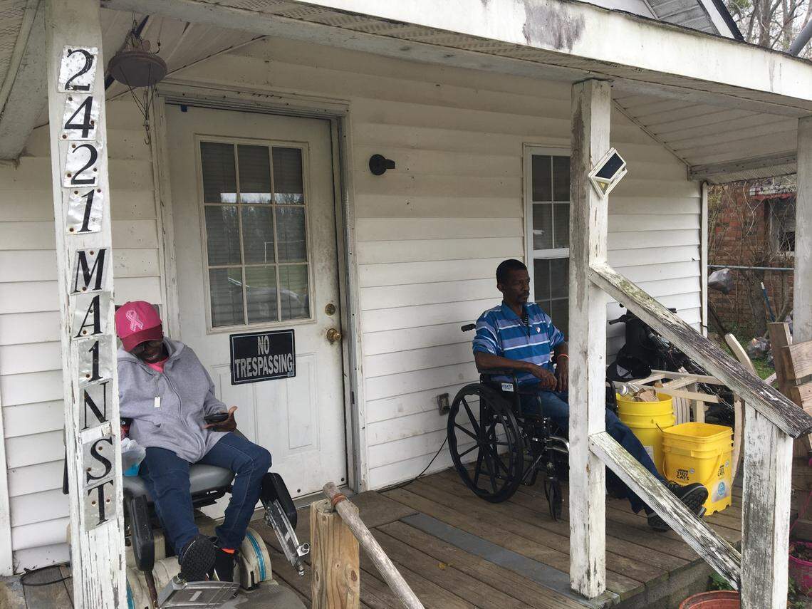 Mold has overwhelmed parts of Sellers, SC, causing people like these residents to flee their homes and seek shelter with friends. Repeat floods are blamed for the mold problems.