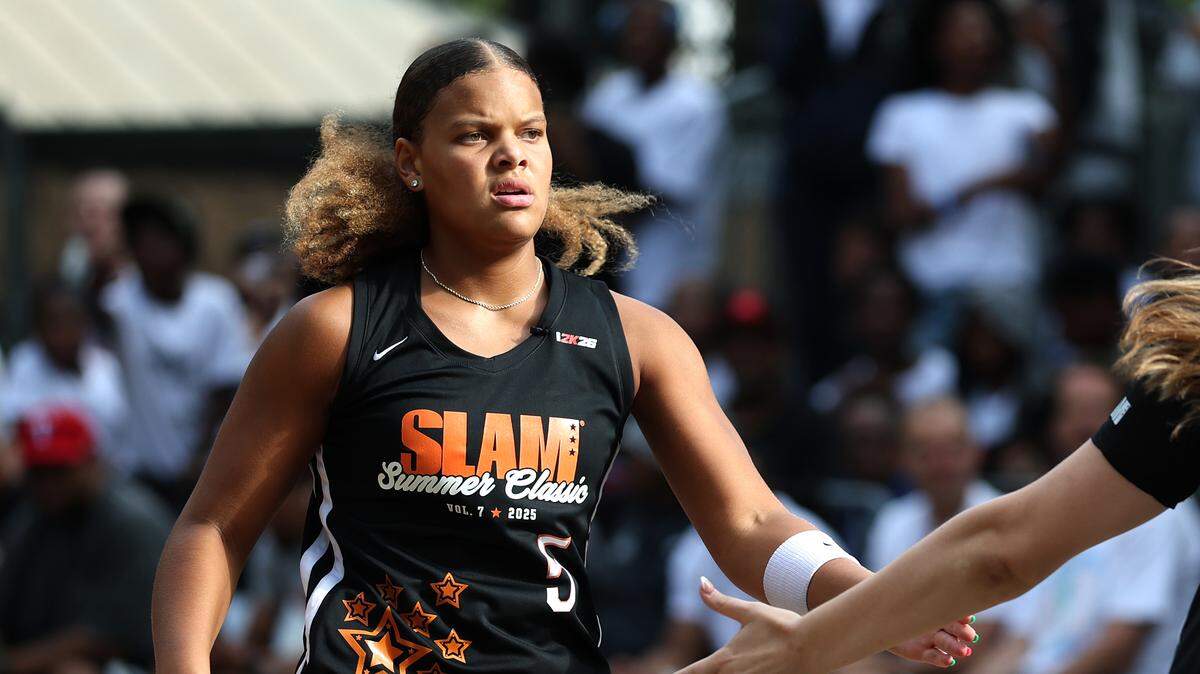 NEW YORK, NEW YORK - AUGUST 18: Class of 2026 recruit Jerzy Robinson #5 reacts during the SLAM Summer Classic at Rucker Park on August 18, 2025 in New York City.