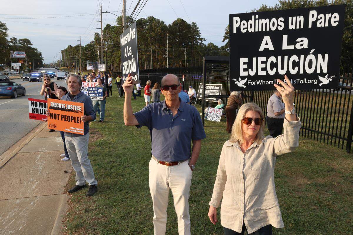 Jim Morton and Mary Frances Morton advocate to stop the scheduled execution of Richard Moore during a protest outside Broad River Correctional Institution on Friday Nov. 1, 2024. “This is not a death penalty case”, Jim Morton said, “This is politics.” Morton served as an attorney for Moore during his appeals process.