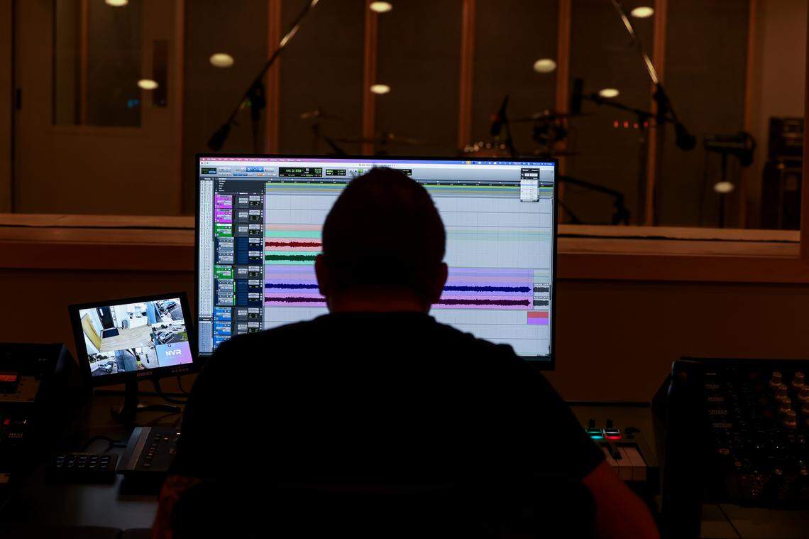 Kenny McWilliams works in Archer Avenue Studio at River Drive Creative in Columbia on Wednesday, June 18, 2025. The building houses the recording studio and Caroline Guitar Company.