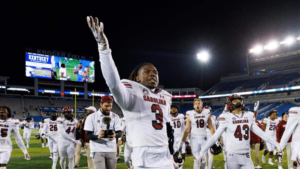 South Carolina defensive back Devonni Reed (3) gestures to fans in celebration after the team’s win over Kentucky in an NCAA college football game in Lexington, Ky., Saturday, Oct. 8, 2022. (AP Photo/Michael Clubb)