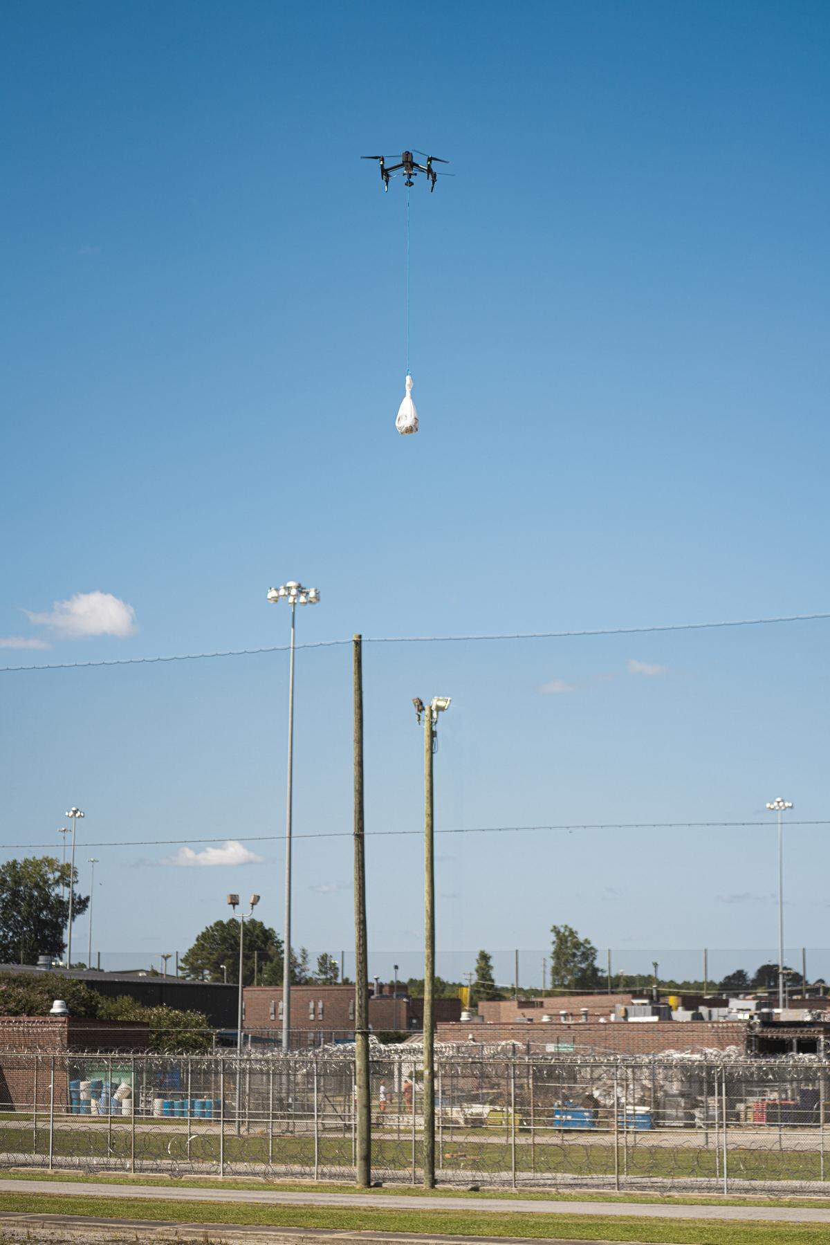 SCDC demonstrates a drone carrying contraband flying over a 50-foot net at an S.C. prison.