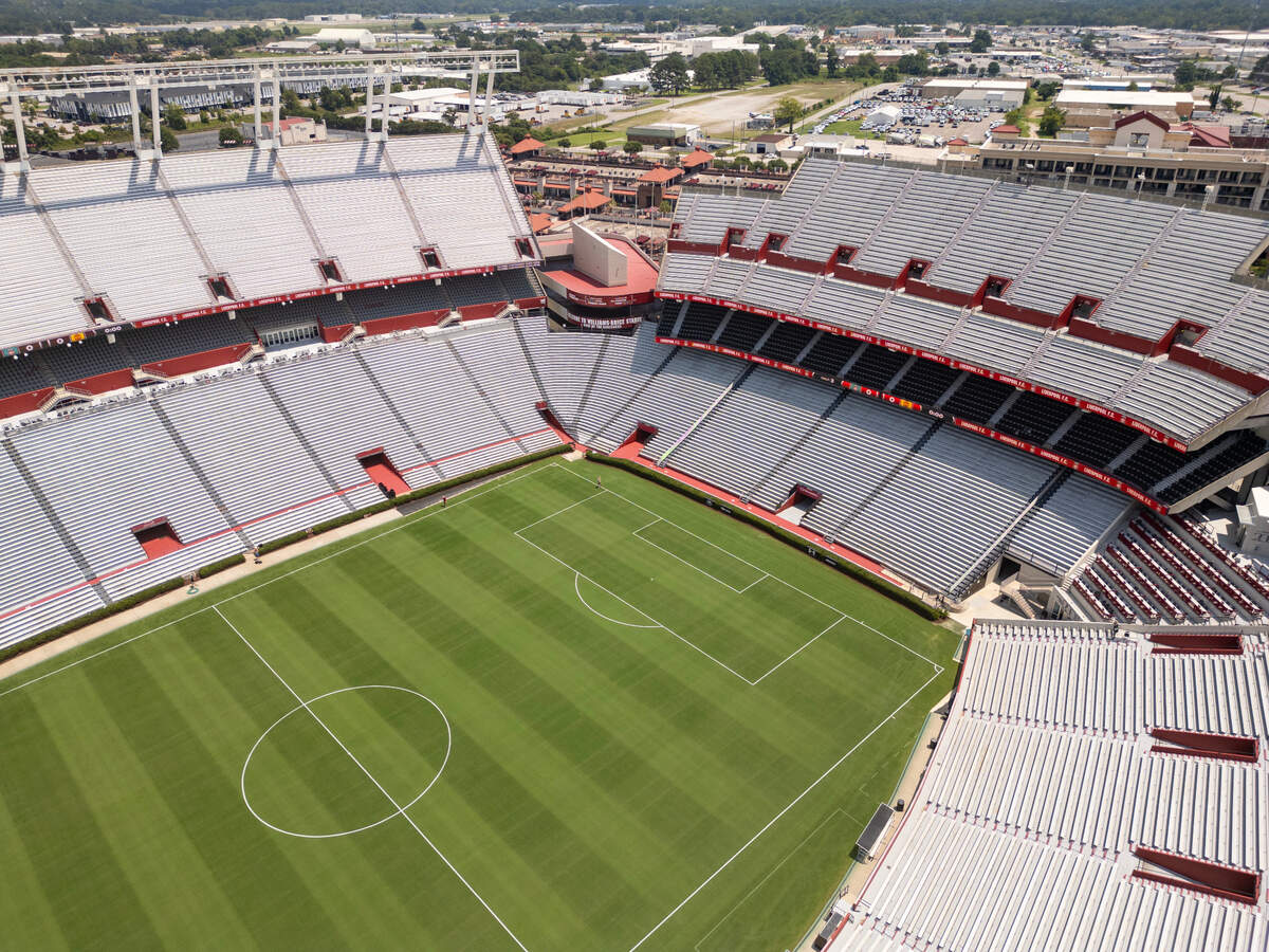 Williams-Brice Stadium is painted Tuesday for the Rivals in Red tour matchup Saturday between Premier League teams Liverpool and Manchester United. The two United Kingdom soccer teams are some of the most popular in America.