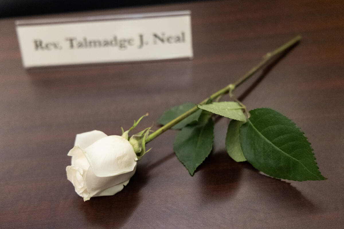 A white rose representing Rev. Talmadge Neal lays on a table during a hearing of the South Carolina Fifth Judicial Circuit where Solicitor Byron Gipson called for his criminal record to be expunged at the Richland County Judicial Center on Friday, October 25, 2024.