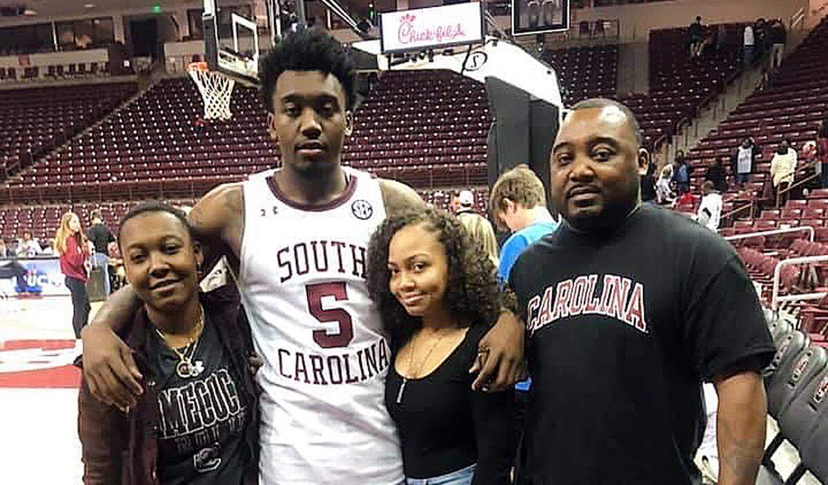 Jermaine Couisnard with his father, Jeremaine Couisnard, and sisters Maya and Kalani