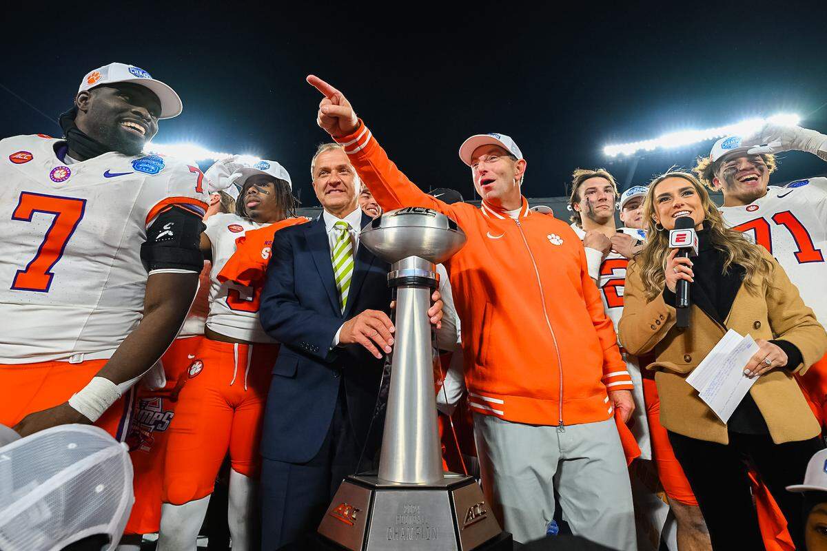 Clemson coach Dabo Swinney and his team celebrate winning the 2024 ACC championship game