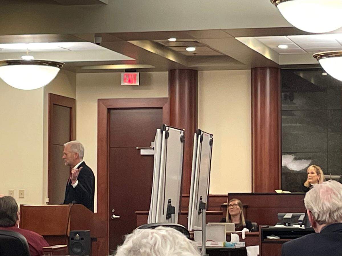 Prosecutor Shawn Graham points toward Adam Lazzarini during closing arguments of the trial.