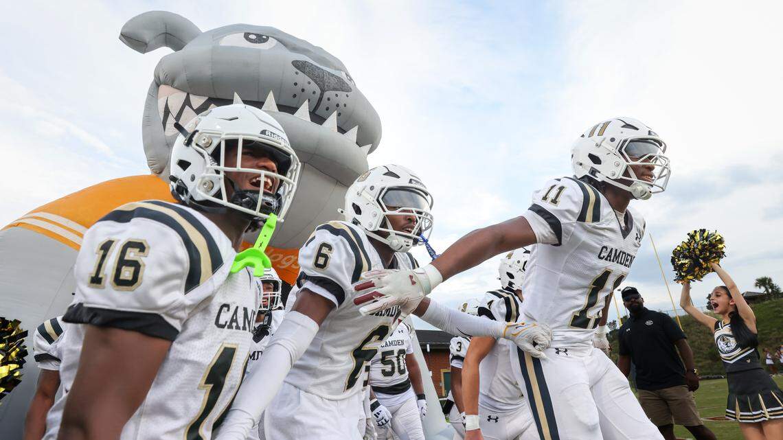 Camden players prepare to take the field before White Knoll’s game against Camden in Lexington on Thursday, August 21, 2025.