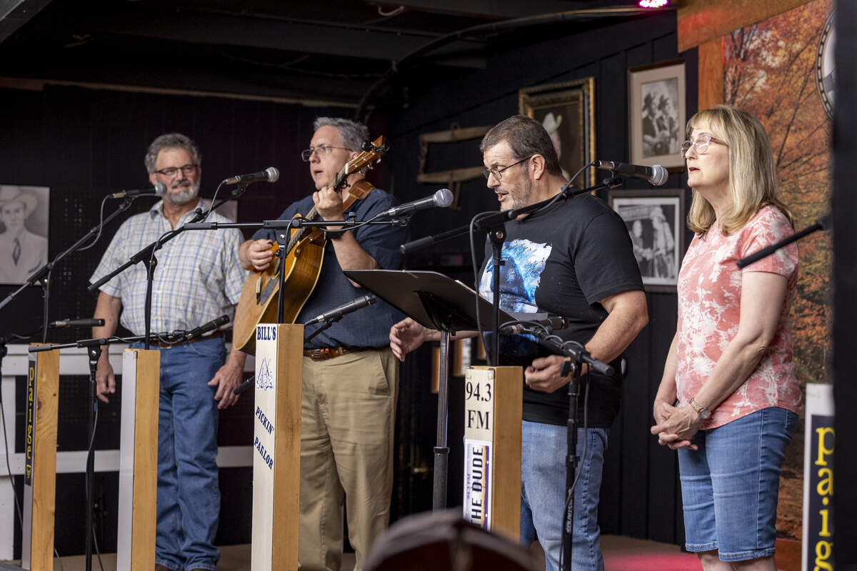 Leonard Cox, from left, Frank Thomas, Edwin Bradshaw and Marilyn Bradshaw, perform “Washed in the blood of the Lamb"  at Bill’s Pickin’ Parlor in West Columbia on Friday, April 24, 2026.