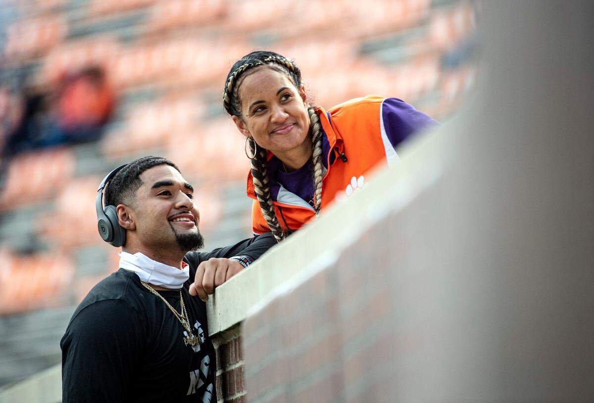 Clemson quarterback D.J. Uiagalelei (5) smiles with his mother Tausha Uiagalelei during pregame before the game against Boston College.