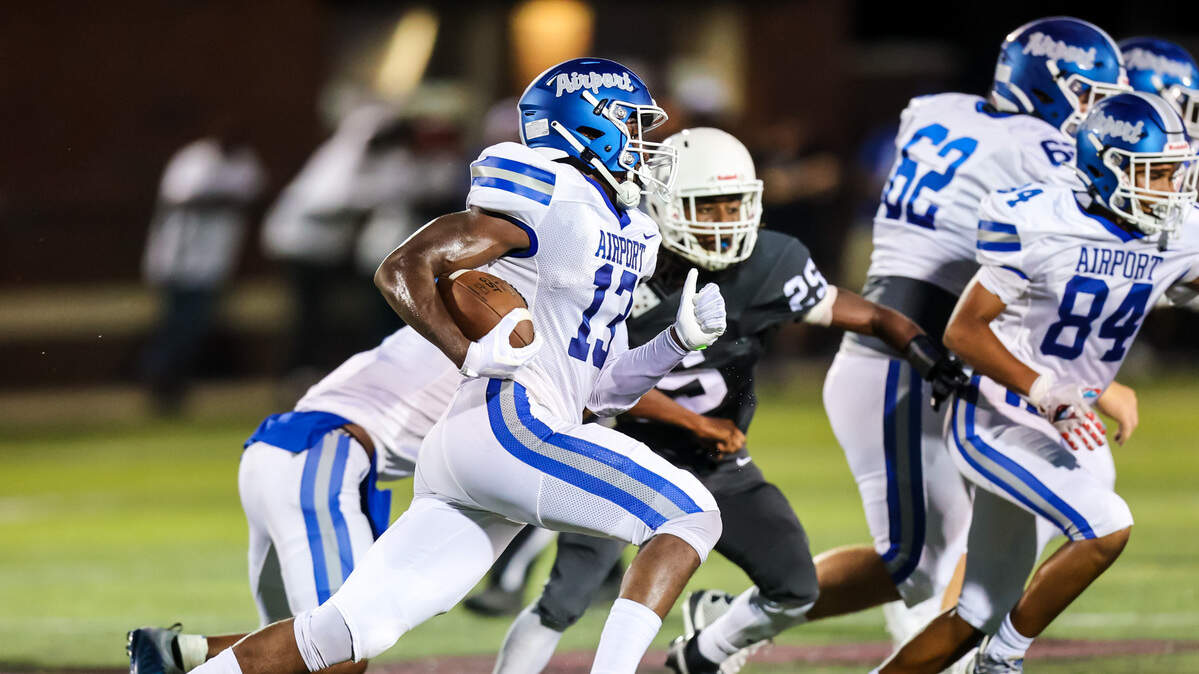 Airport Eagles wide receiver Apollos Cook (13) rushes during the game at Brookland-Cayce High School Friday, Aug. 26, 2022.