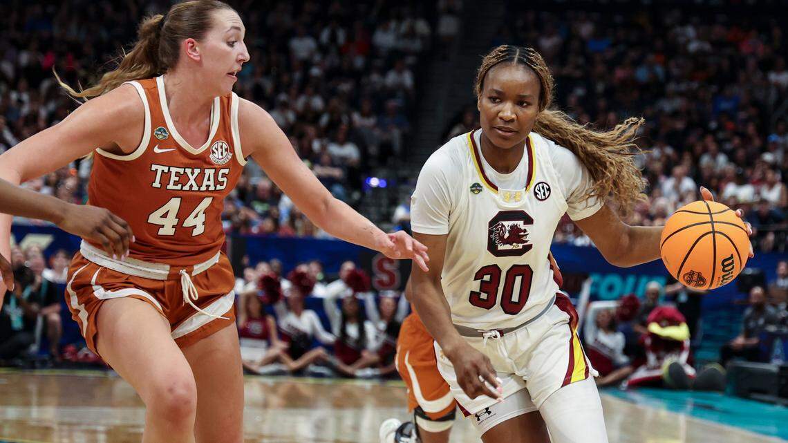 University of South Carolina’s Maryam Dauda (30) drives to the basket as Texas’ Taylor Jones (44) pressures in the first half of action at Amalie Arena in Tampa, Fla. on Friday, April 4, 2025.