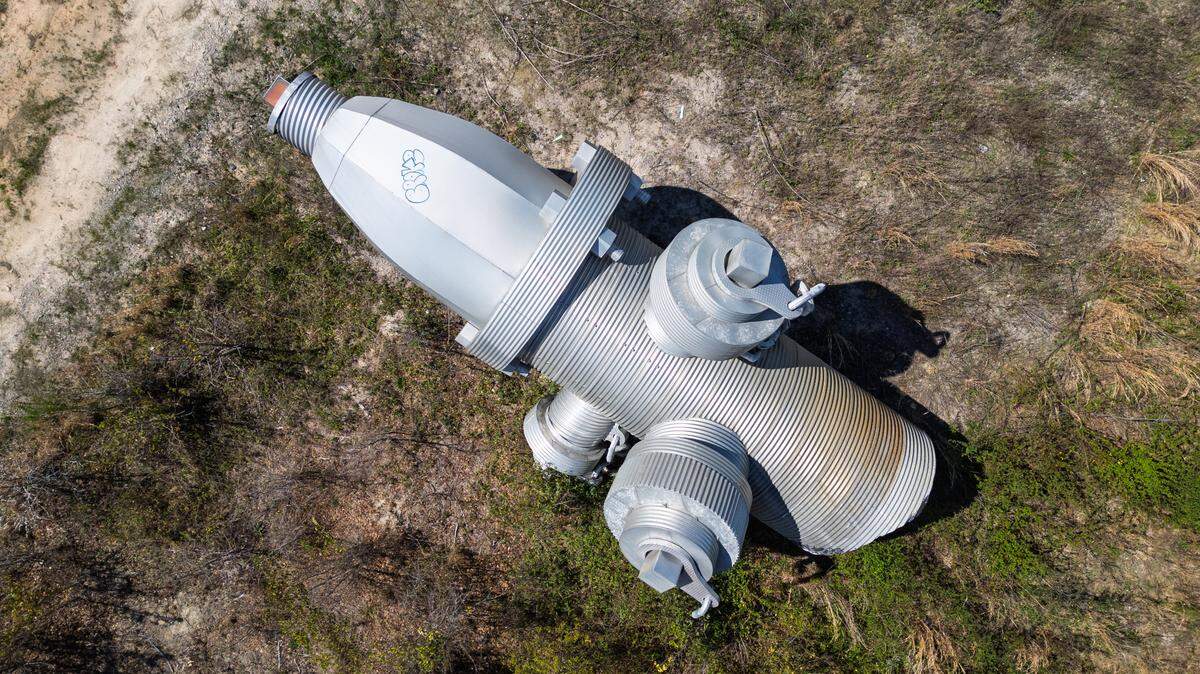 Busted Plug, a sculpture by Columbia artist Blue Sky, lies in a field north of Columbia on Wednesday, March 26, 2025. The 40-foot sculpture was installed in downtown Columbia from 2001-2023.