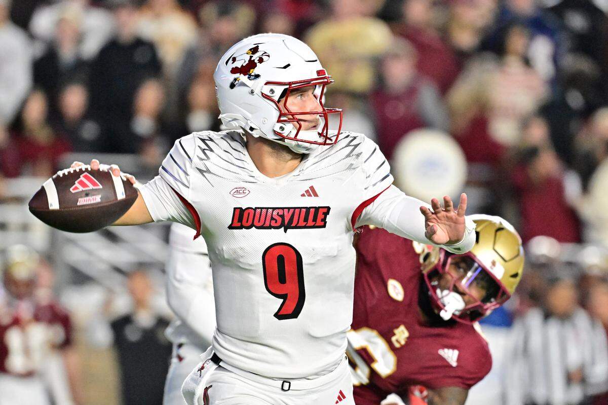 Oct 25, 2024; Chestnut Hill, Massachusetts, USA; Louisville Cardinals quarterback Tyler Shough (9) passes the ball against the Boston College Eagles during the first half at Alumni Stadium.