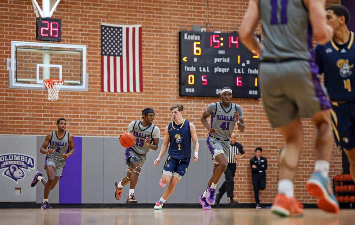 AJ Vaught (15) of Columbia College brings the ball up the court during the Koalas’ game against Columbia International University at Godbold Gym in Columbia on Feb. 12.