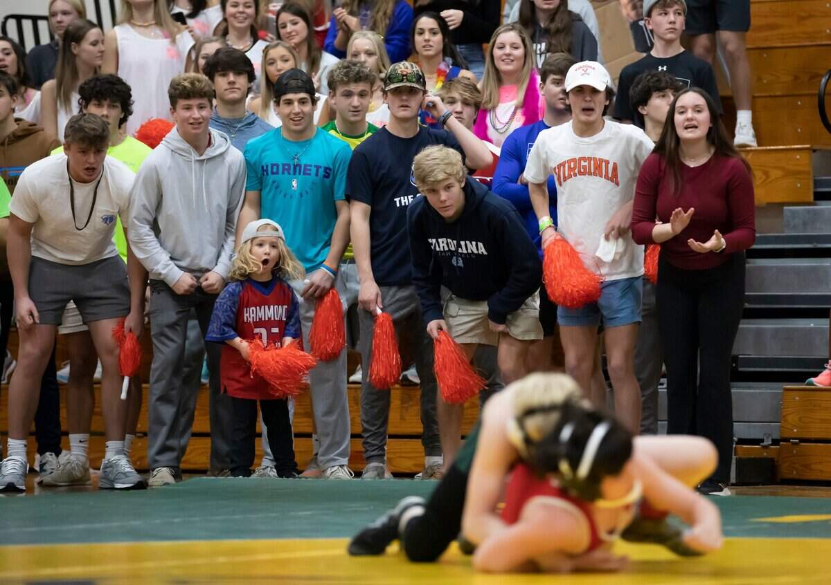 Hammond School fans cheer on James Meachum during the SCISA 2022 Duals State Wrestling Tournament at Ben Lippen on Saturday, February 5, 2022.