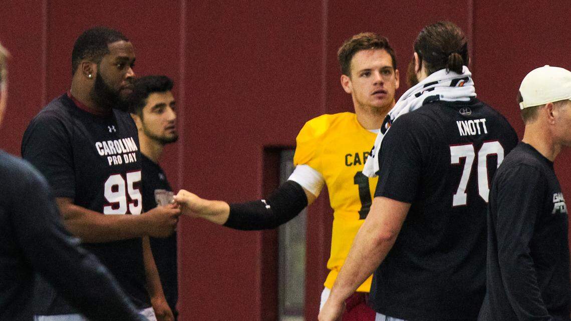 South Carolina quarterback Jake Bentley talks with Alan Knott and Dante Sawyer during the Gamecocks Pro Day.