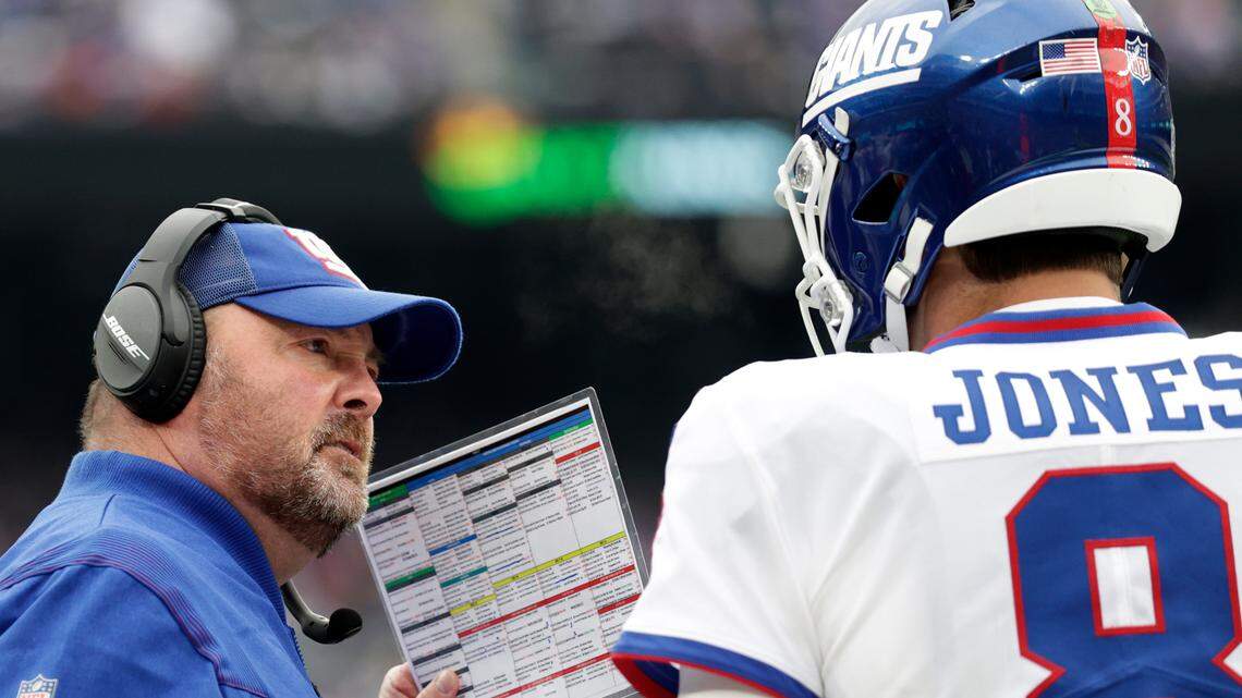 From Nov. 28, 2021, then-New York Giants interim offensive coordinator Freddie Kitchens talks to Daniel Jones during a game against the Philadelphia Eagles, Sunday, Nov. 28, 2021, in East Rutherford, N.J. (AP Photo/Adam Hunger)