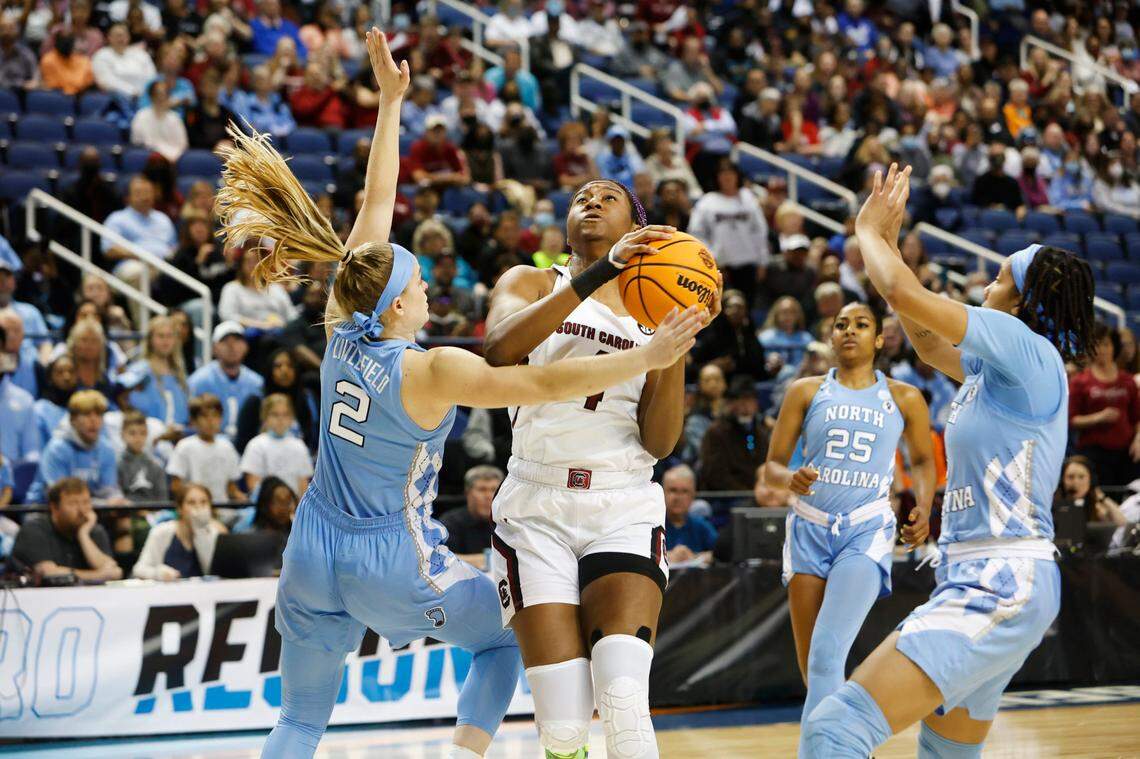 South Carolina’s Aliyah Boston (4) is pressured by North Carolina’s Carlie Littlefield (2) during the Sweet 16 game at the the Greensboro Coliseum on Friday.