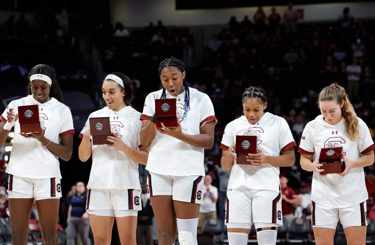 Gamecocks admire their 2022 National Championship rings in the Colonial Life Arena on Monday, Nov. 07, 2022.